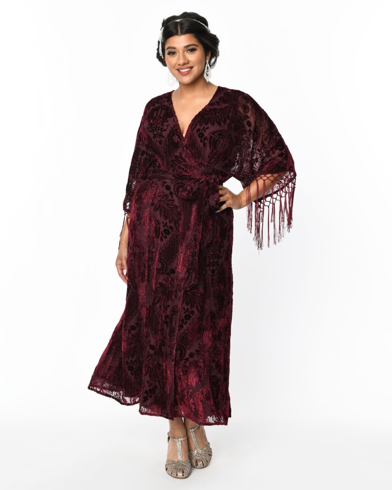Front of a model wearing a size 4X Unique Vintage Burgundy Velvet Floral Burnout Wrap Midi Dress in Burgundy Floral by Unique Vintage. | dia_product_style_image_id:317013